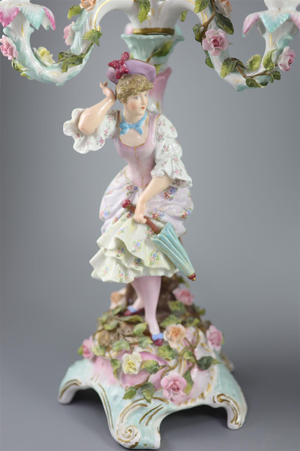 A pair of early 20th century Plaue porcelain figural candelabra, overall height 48cm